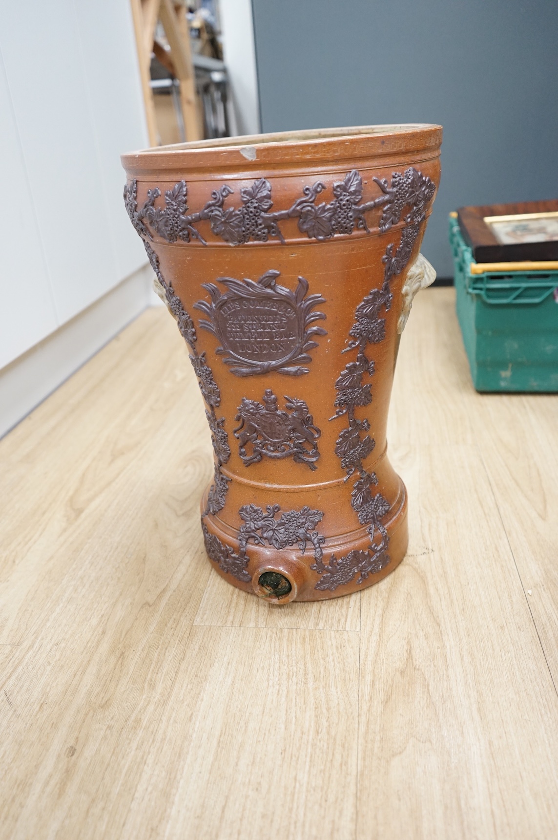 A Victorian salt glazed water filter and a stoneware jar, tallest 48cm